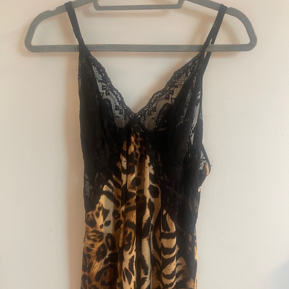 Women’s cheetah print black lace dress.